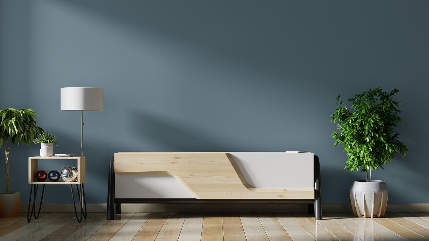 Room with a deep blue-grey painted wall, interior painting in Lakeland FL